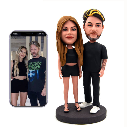 Customized young couple bobblehead dolls