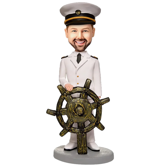 A personalized  nodding bobblehead doll of a navy helmsman